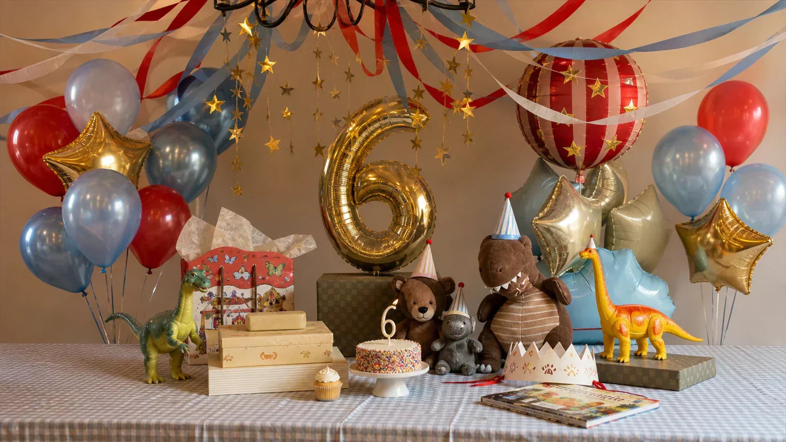Kids birthday party at home with dinosaur decorations, balloons, stuffed animals and a cake table