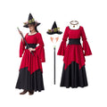 Woman wearing a burgundy and black witch costume with decorated hat, elf ears, necklace and scepter