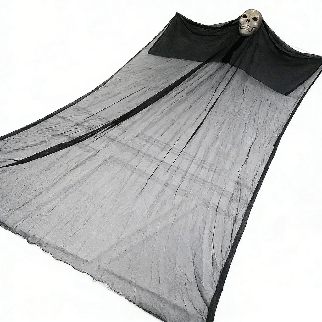 A themed setting presents lighted hanging skull ghost angled display, with the skull head, wide black gauze and long hanging silhouette clearly visible.