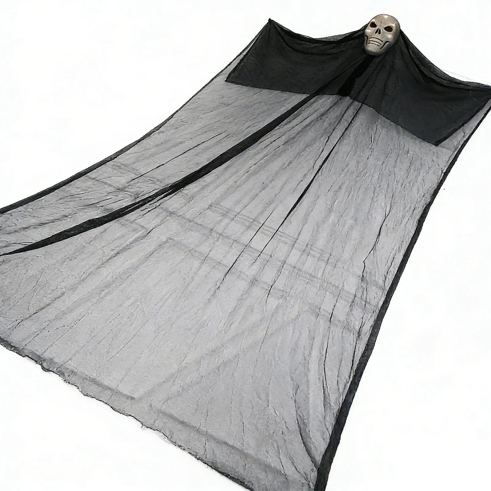 A themed setting presents lighted hanging skull ghost angled display, with the skull head, wide black gauze and long hanging silhouette clearly visible.