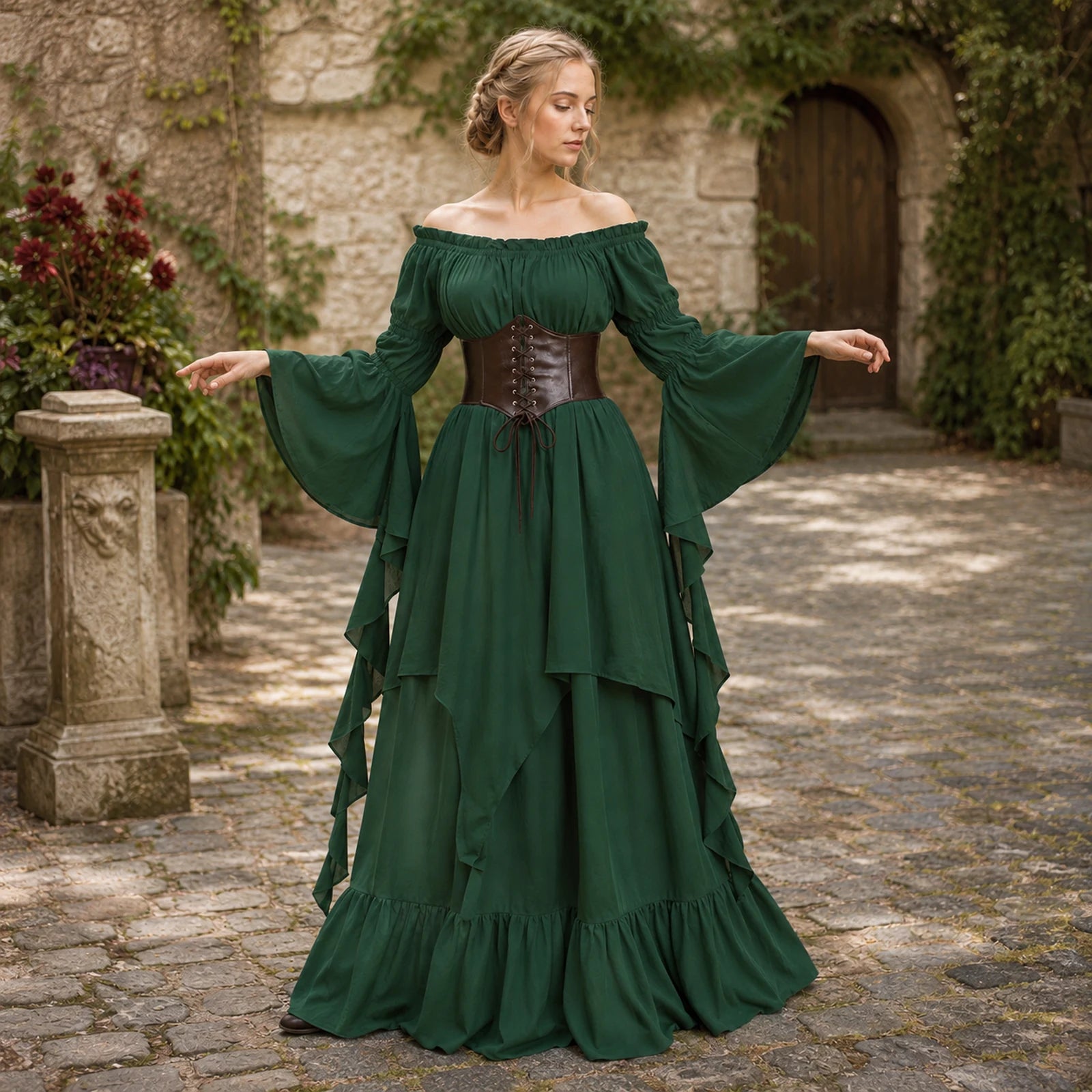 Woman wearing a dark green medieval dress with brown waist cincher in a stone courtyard
