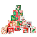 Assorted numbered Christmas advent calendar boxes arranged together with Santa, reindeer and penguin designs.