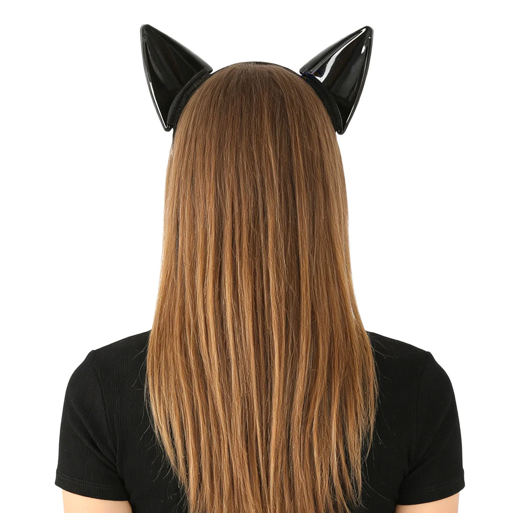 Side view of the black cat ear headband, showing its profile and visible construction details.