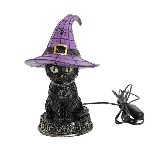Front view of the black cat lamp with a purple witch hat, green eyes, crescent pendant, gothic base, and attached USB-A cable.