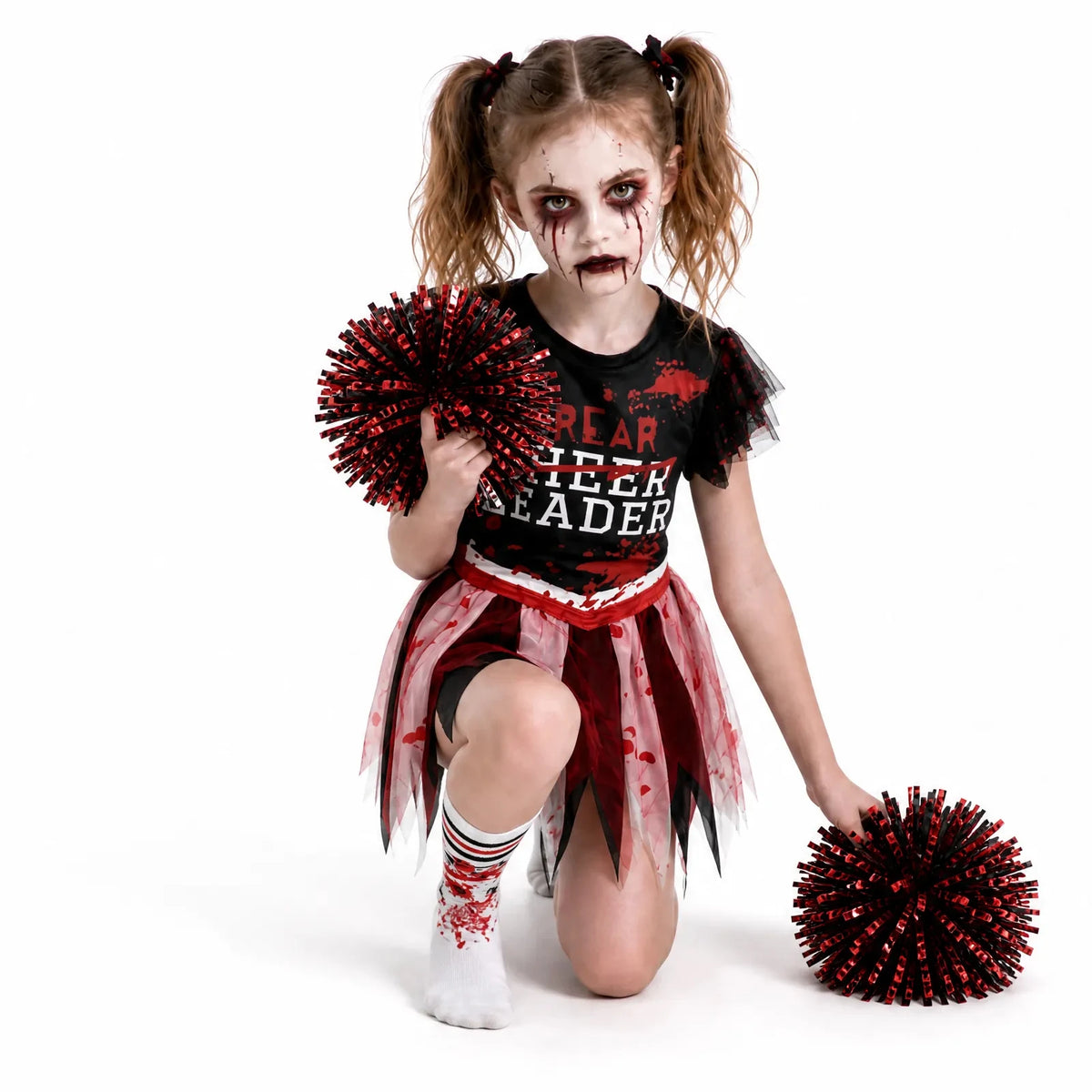 A kneeling model shows the layered sleeves, pointed skirt and striped printed socks.