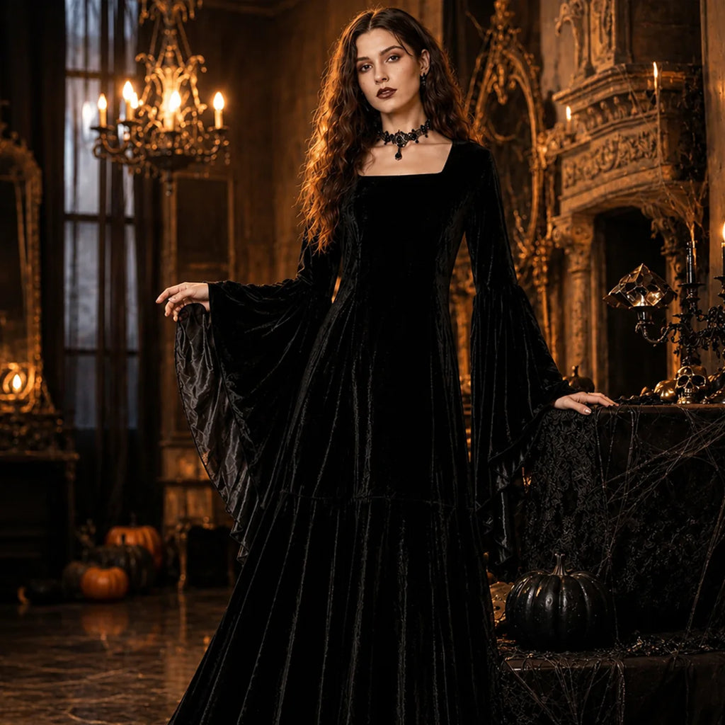 Woman wearing black ghost bride dress in Gothic interior
