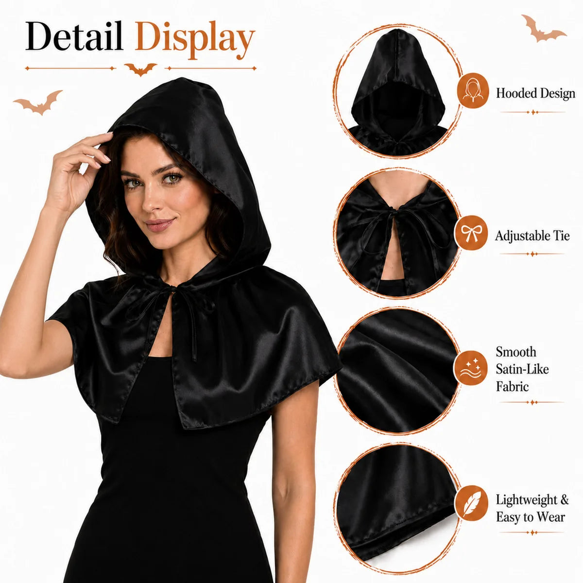 Close-up of the black satin hooded capelet showing the hood, neck tie, smooth fabric and lightweight design.
