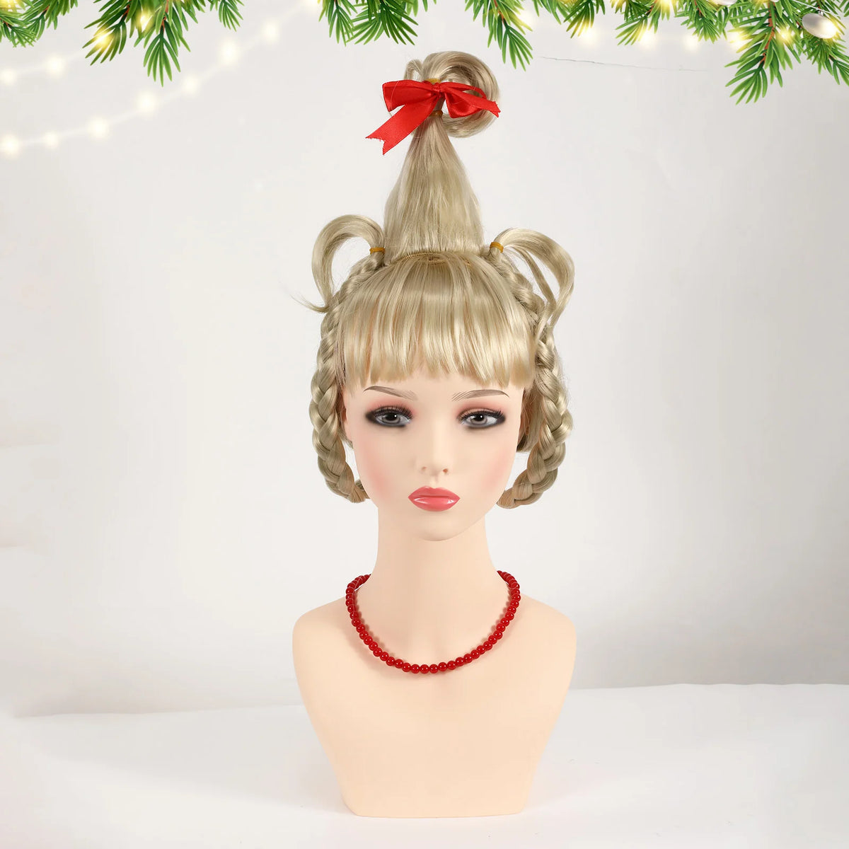 Front mannequin view of the blonde braided wig with red bow and necklace.