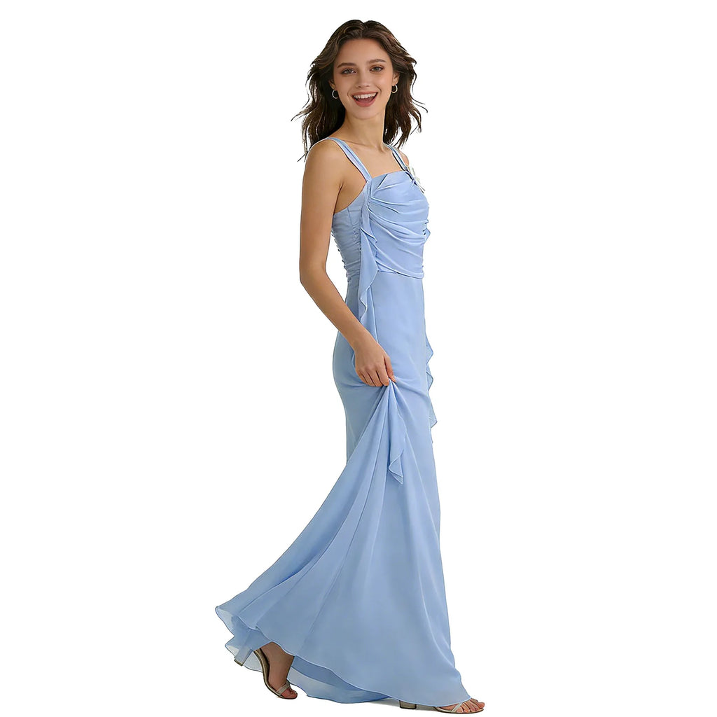 A model wears the blue daisy ribbon maxi dress in side profile against a white background to show its fitted silhouette.
