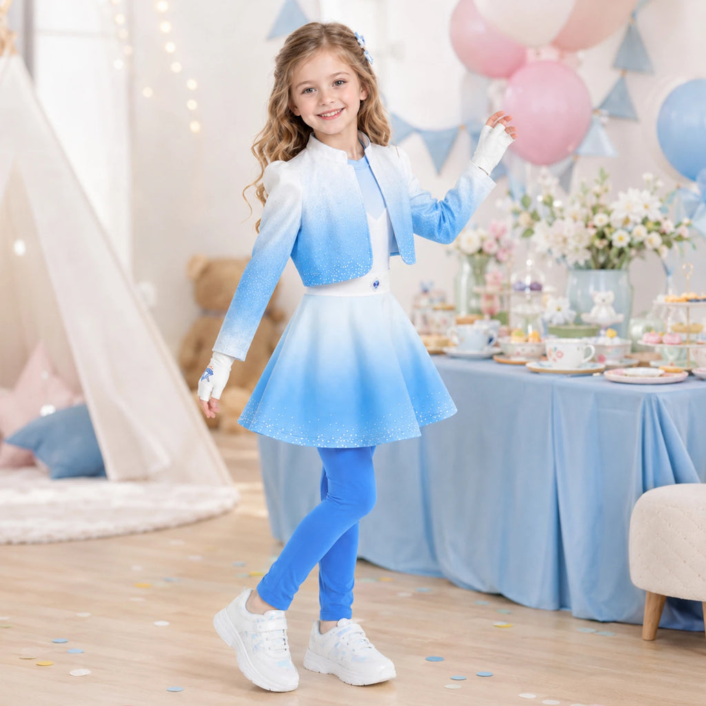 A child models the blue princess costume inspired by Descendants at a pastel birthday-party table.