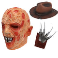 A clear product view presents a burned horror mask costume set with brown hat and claw glove worn by an adult, with the burned-face mask, brown hat and metal-look claw glove clearly visible.