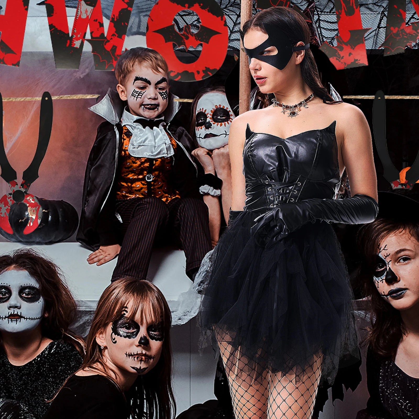 Women's gothic cat costume with layered tulle skirt at a pumpkin party