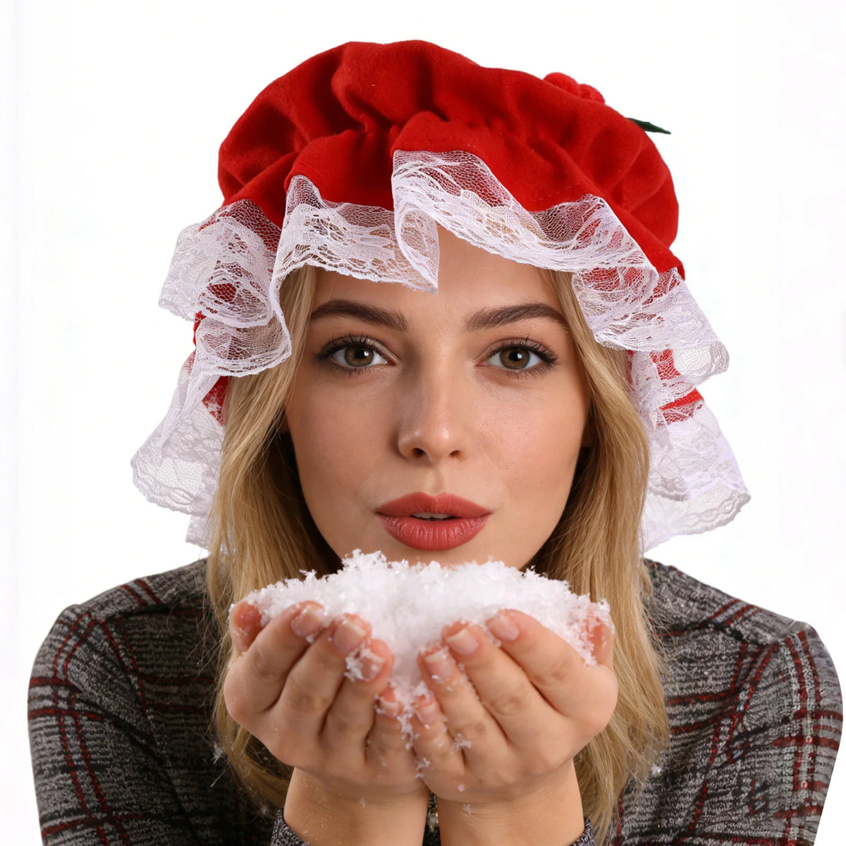A model wears the red bonnet with white lace at its edge.