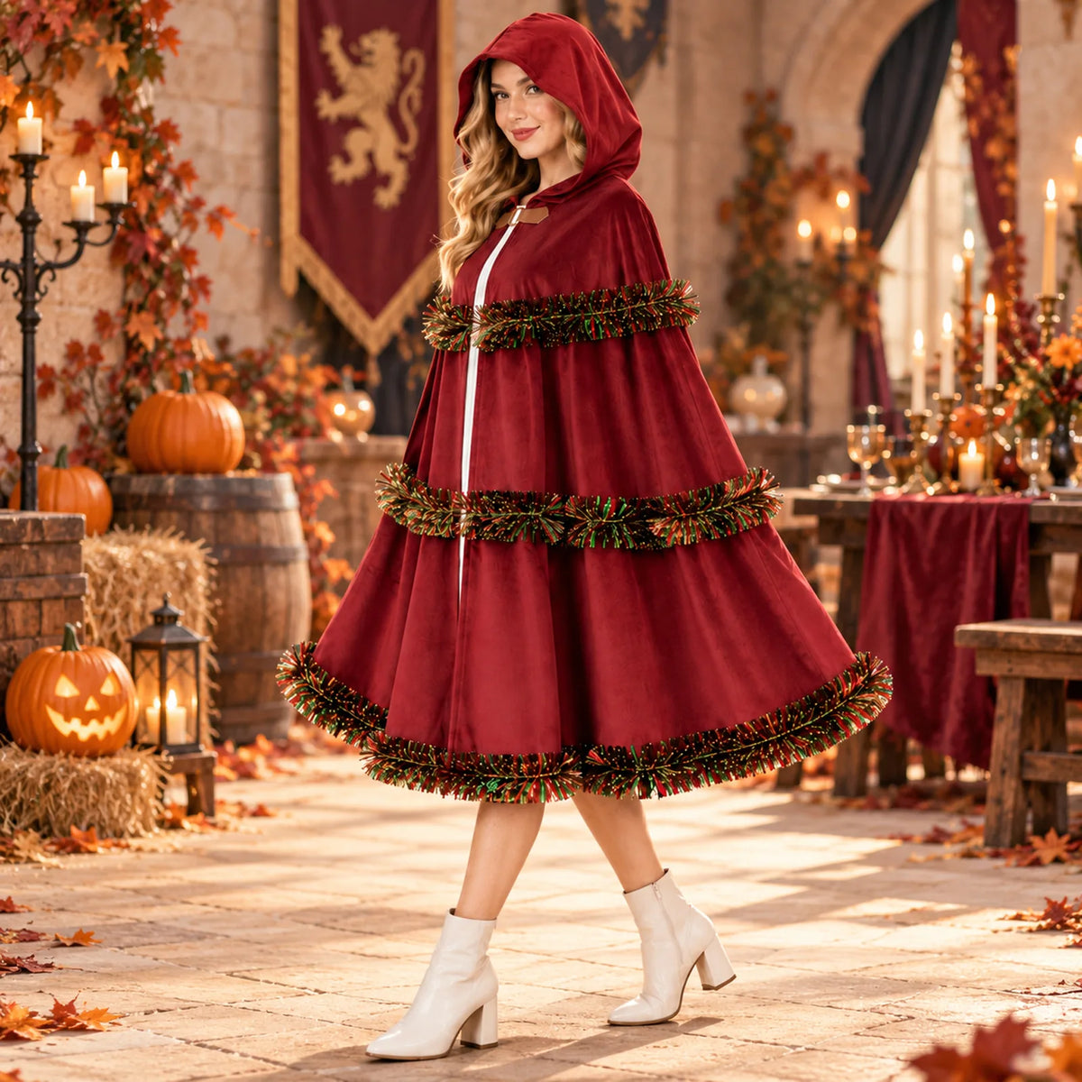 The red cloak appears on a model in a candlelit autumn setting.