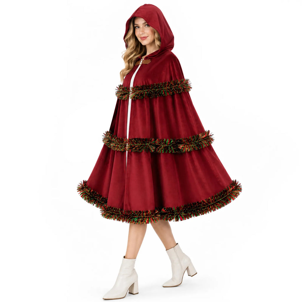 A model wears the red hooded cloak with festive tinsel trim.