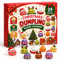 Red Christmas dumpling advent calendar box with cute dumpling characters in Santa hats and reindeer antlers standing in front of it.