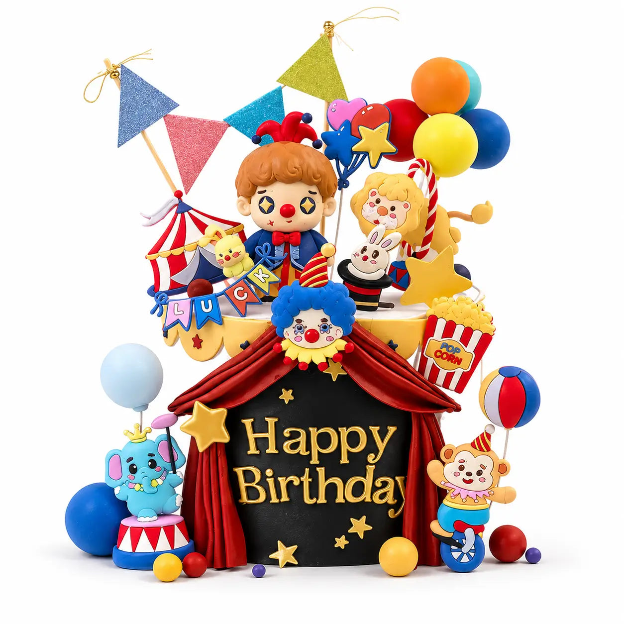 Colorful circus-themed birthday cake topper set featuring a clown, circus tent, balloons, popcorn, a lion, bunny, and elephant figurines with a "Happy Birthday" sign, perfect for kids' birthday celebrations.