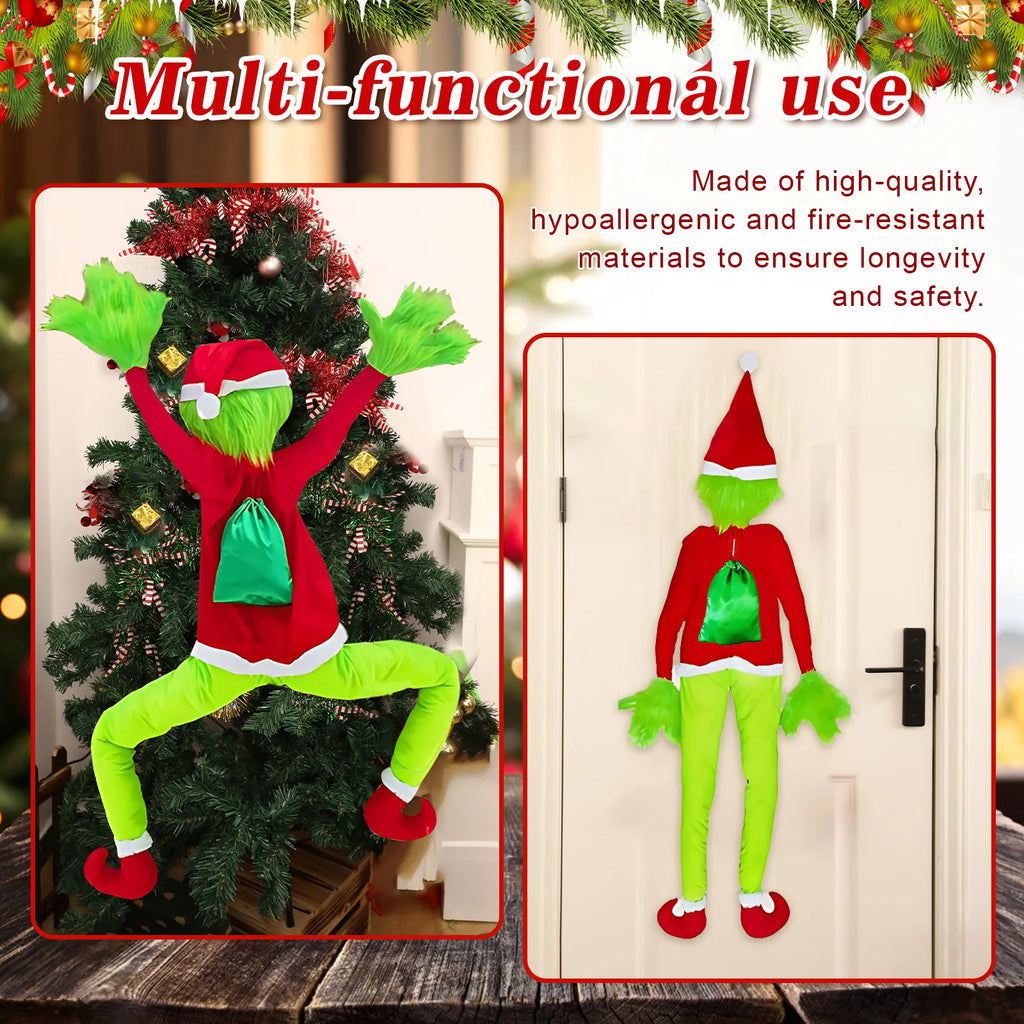 Multi-functional use image of the climbing Christmas character decoration (Inspired by the Grinch) with green sack on a tree and a door