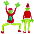 Green furry climbing Christmas character decoration (Inspired by the Grinch) in red sweater and Santa hat with green gift sack, shown front and back