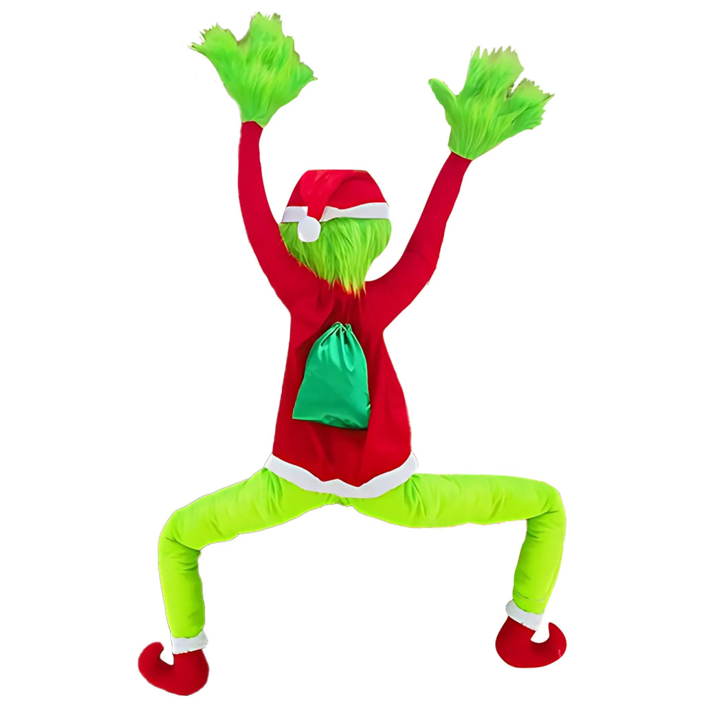 Front view of the climbing Christmas character decoration (Inspired by the Grinch) with green sack in a climbing pose on white background