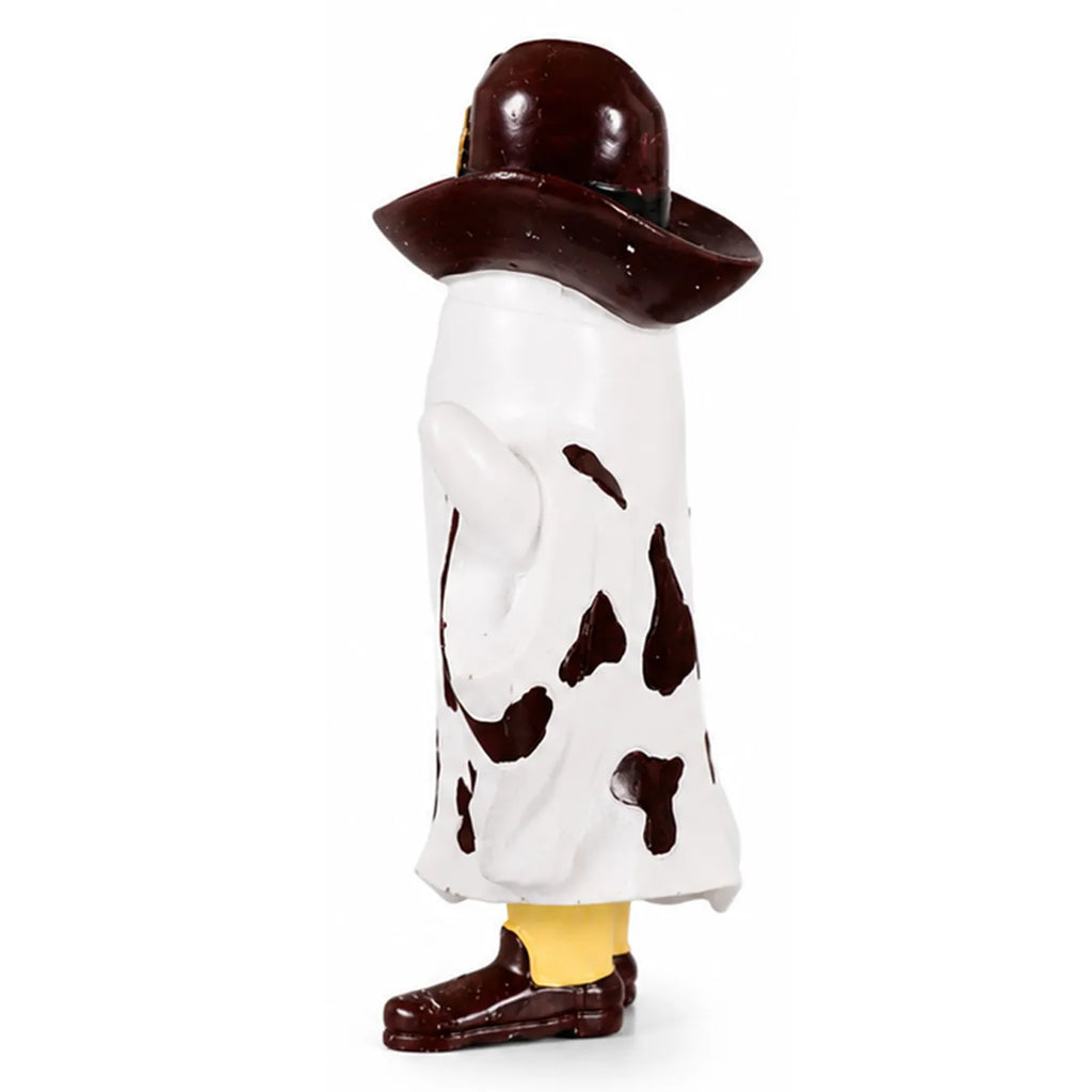 Side view shows the cowboy hat brim and cow-print ghost body.