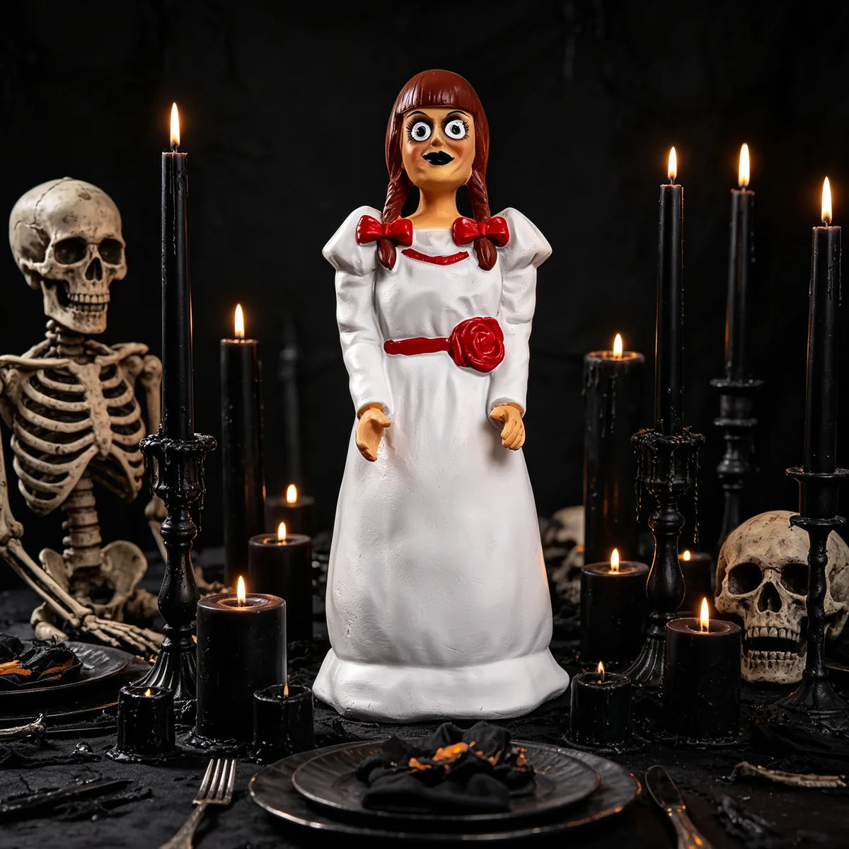 Creepy doll popcorn bucket displayed among black candles and skeleton decor.