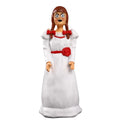 Creepy doll popcorn bucket shown from the front in a white dress.
