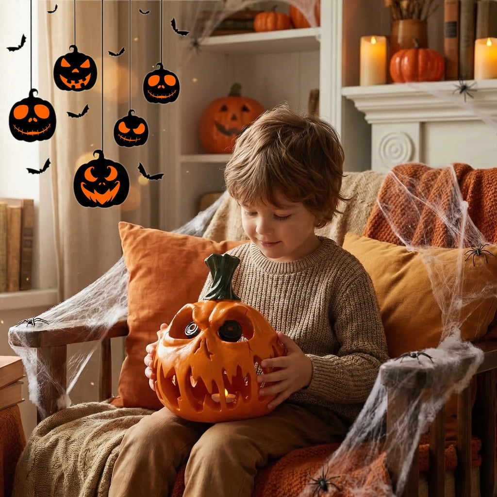 A themed setting presents demon pumpkin Halloween tabletop scene, with the glossy orange finish, fanged face and open interior clearly visible.