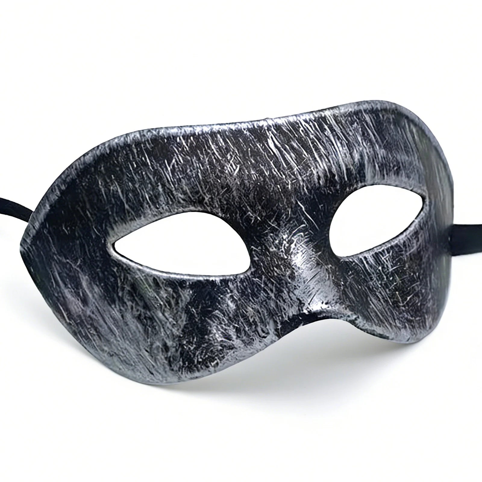 Distressed silver-black masquerade eye mask is shown from the front, with the sculpted eye shape and adjustable black ribbon tie clearly visible.