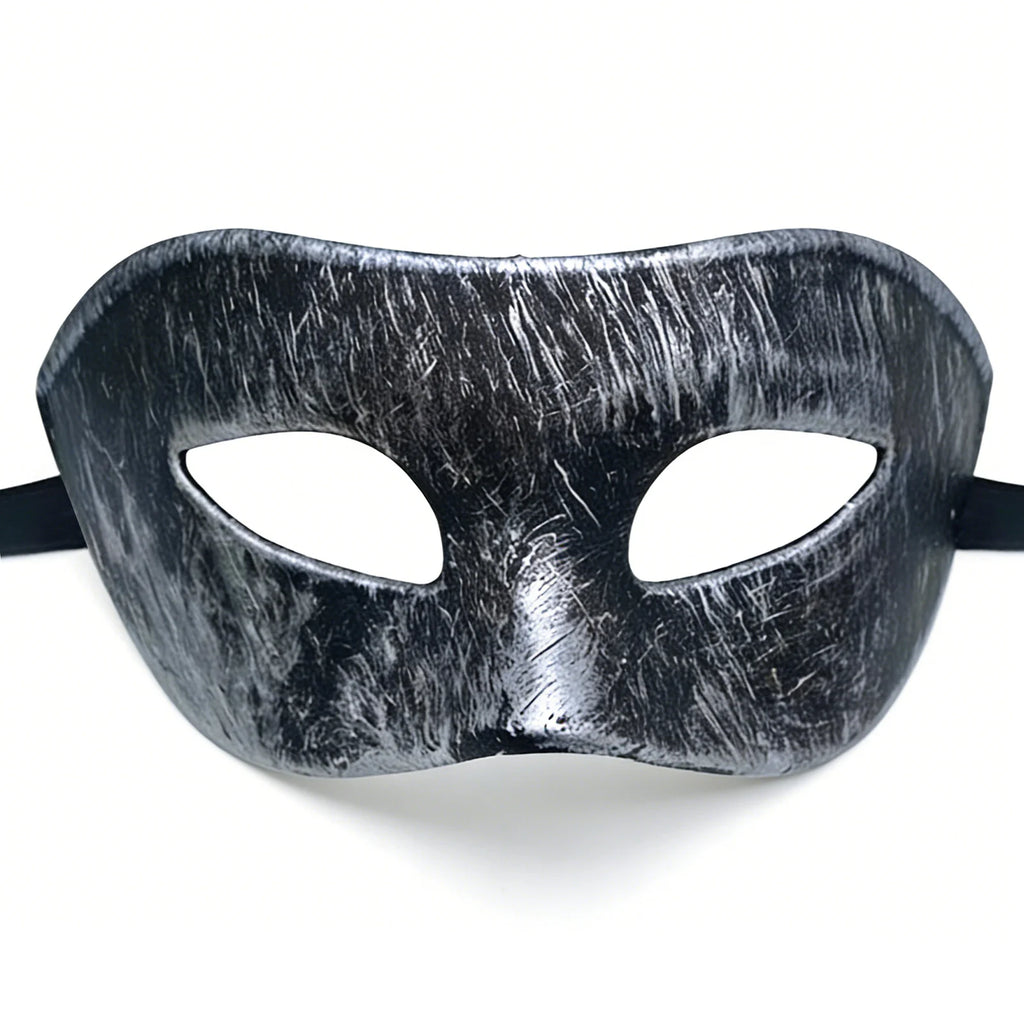 Distressed masquerade mask is shown from a three-quarter angle, highlighting the sculpted eye shape and adjustable black ribbon tie.