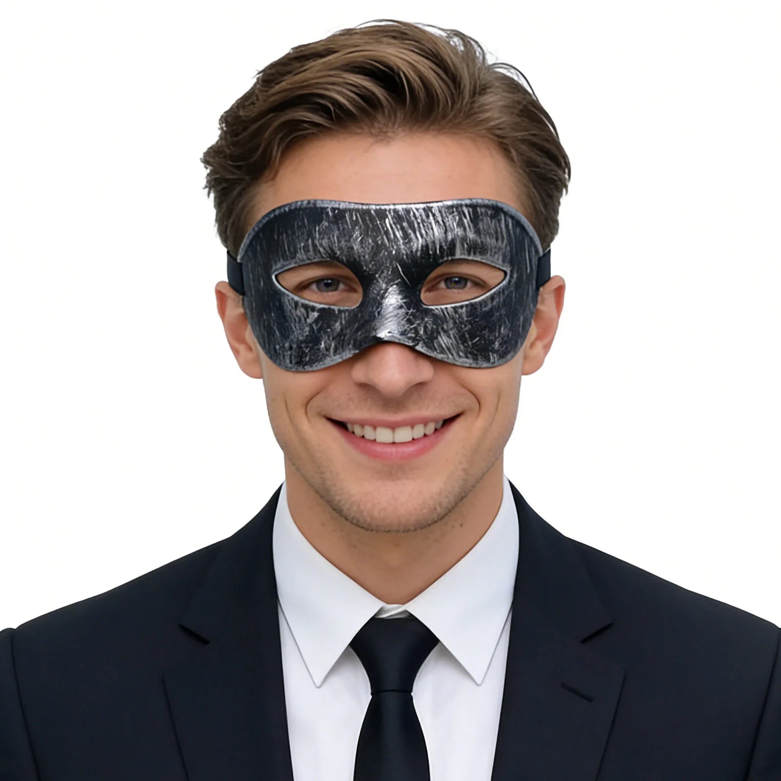 A clear product view presents a vintage black masquerade eye mask with distressed silver finish worn by an adult, with the sculpted eye shape and adjustable black ribbon tie clearly visible.