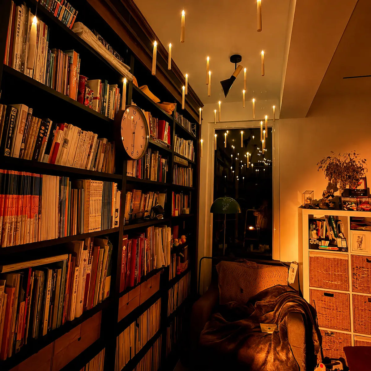 Floating LED candles decorating a warm home library