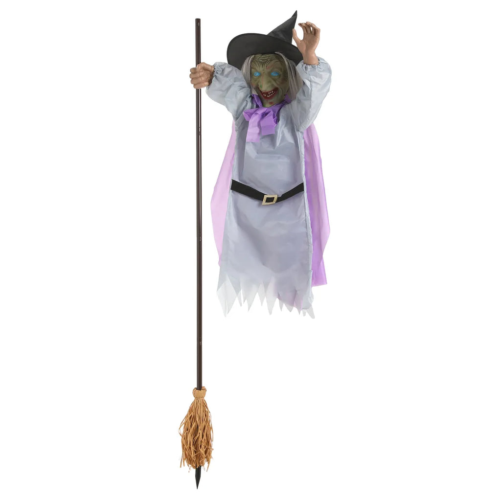 Flying witch decoration shown from the front with assembled broom.