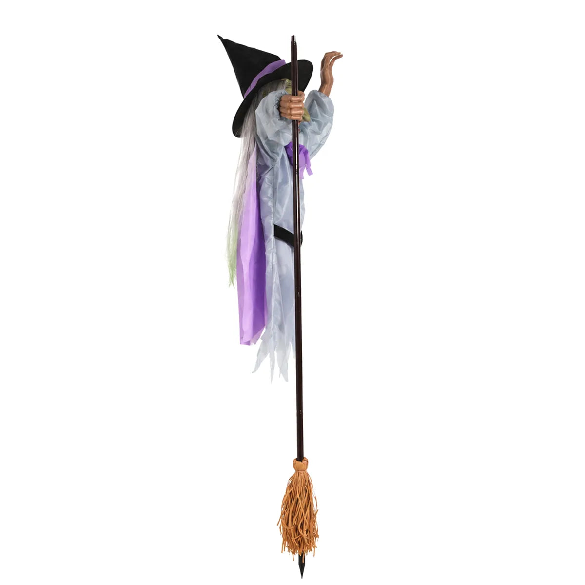 Side view shows the witch body suspended beside the broom pole.