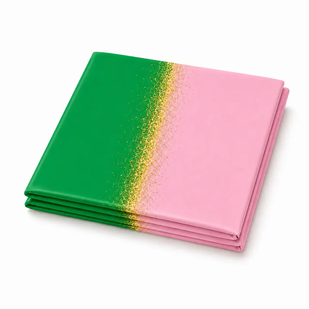Folded green and pink table runner with gold glitter accents for witch party, Halloween, birthday, and themed party table decorations.