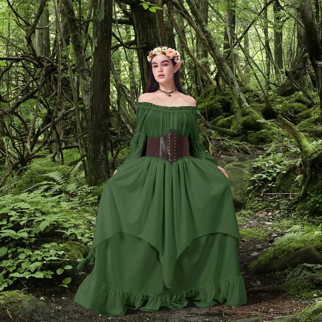 Woman wearing a forest green Renaissance fairy costume with corset belt and floral crown in a woodland setting