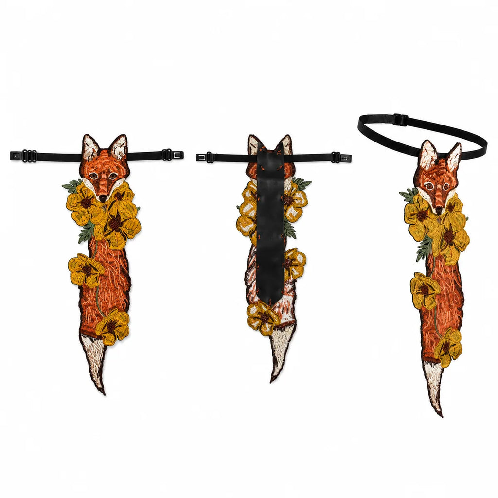 Multiple-angle view of the fox floral embroidered necktie, showing its shape from different sides.