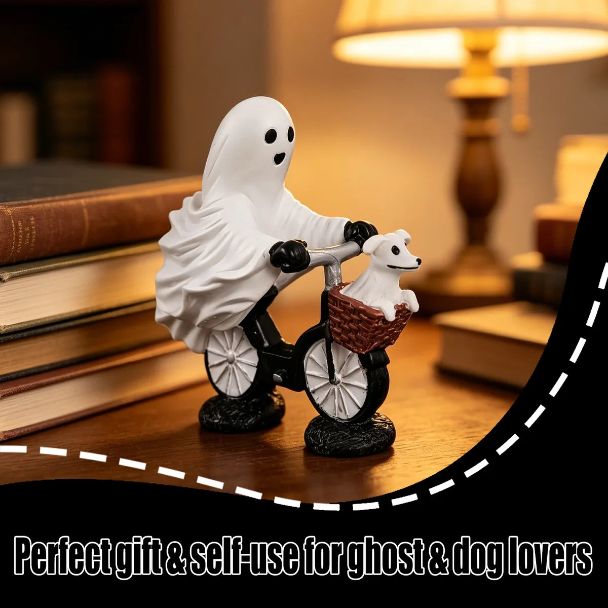 Ghost bicycle dog figurine displayed beside books in a warm reading nook.