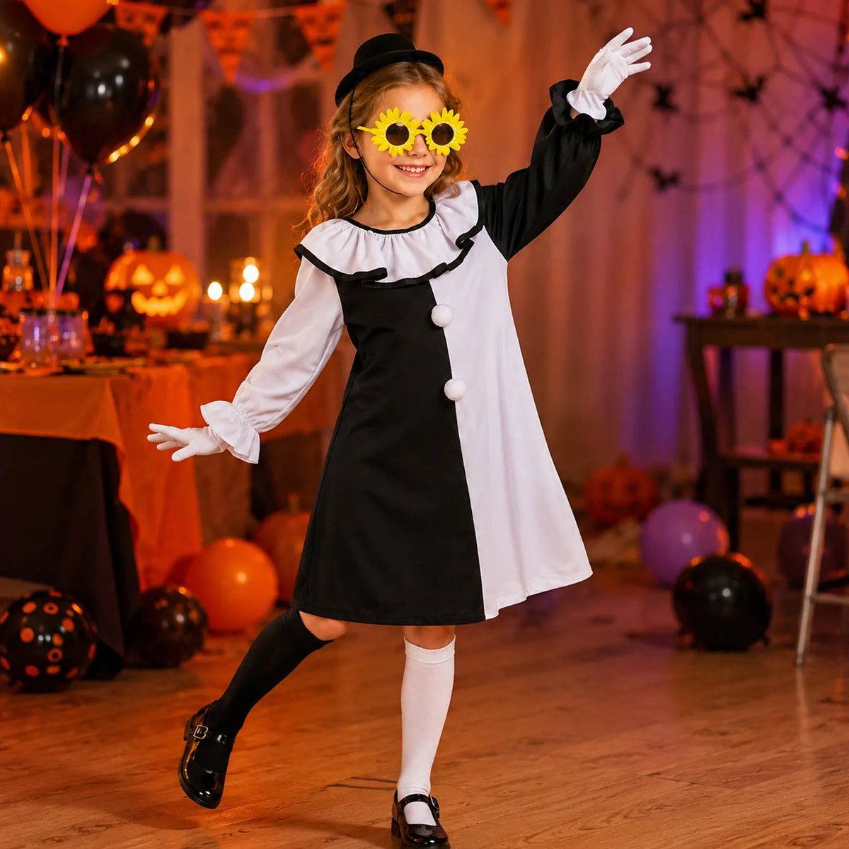 Girl wearing the black-and-white horror clown costume at a Halloween party.