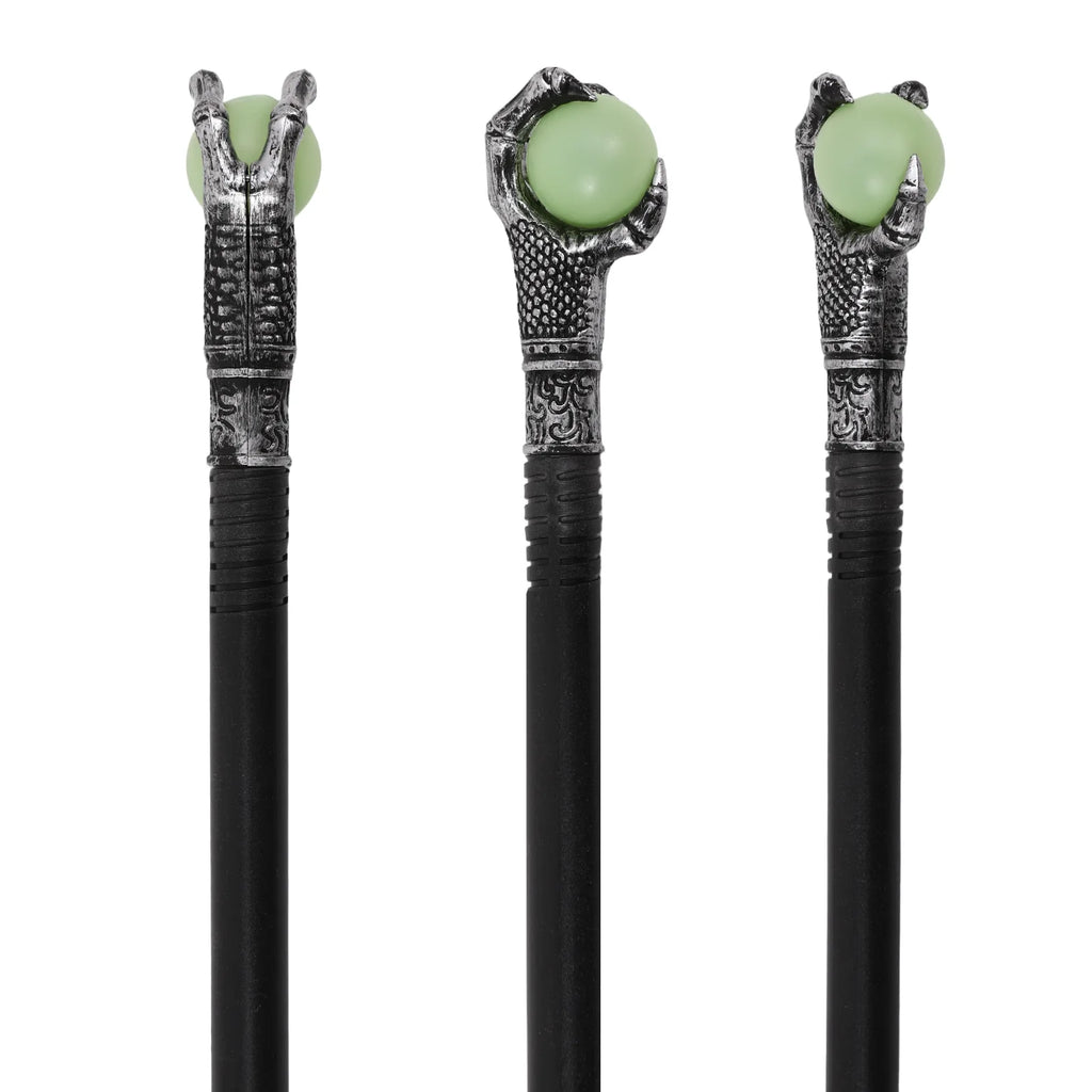 Side view of the glow in the dark eagle claw wand, showing its profile and visible construction details.