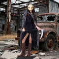Goat mask costume for women styled with black dress and distressed cape at a Halloween event