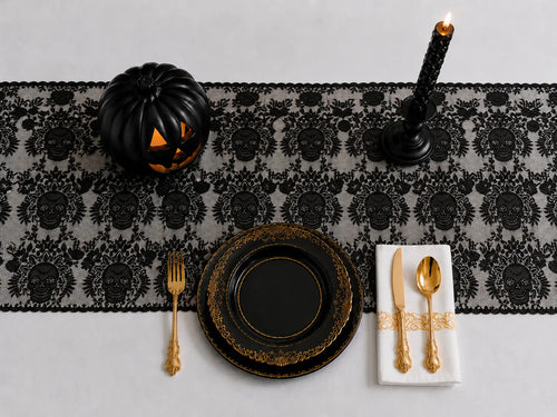 Gothic Halloween black-and-gold tableware set with skull lace runner, black pumpkin, candle holder and gold cutlery