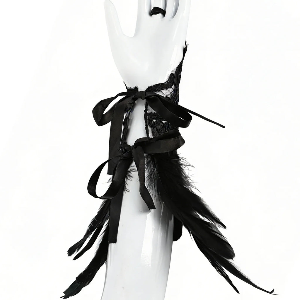Side view of the gothic lace feather wrist cuffs, showing its profile and visible construction details.