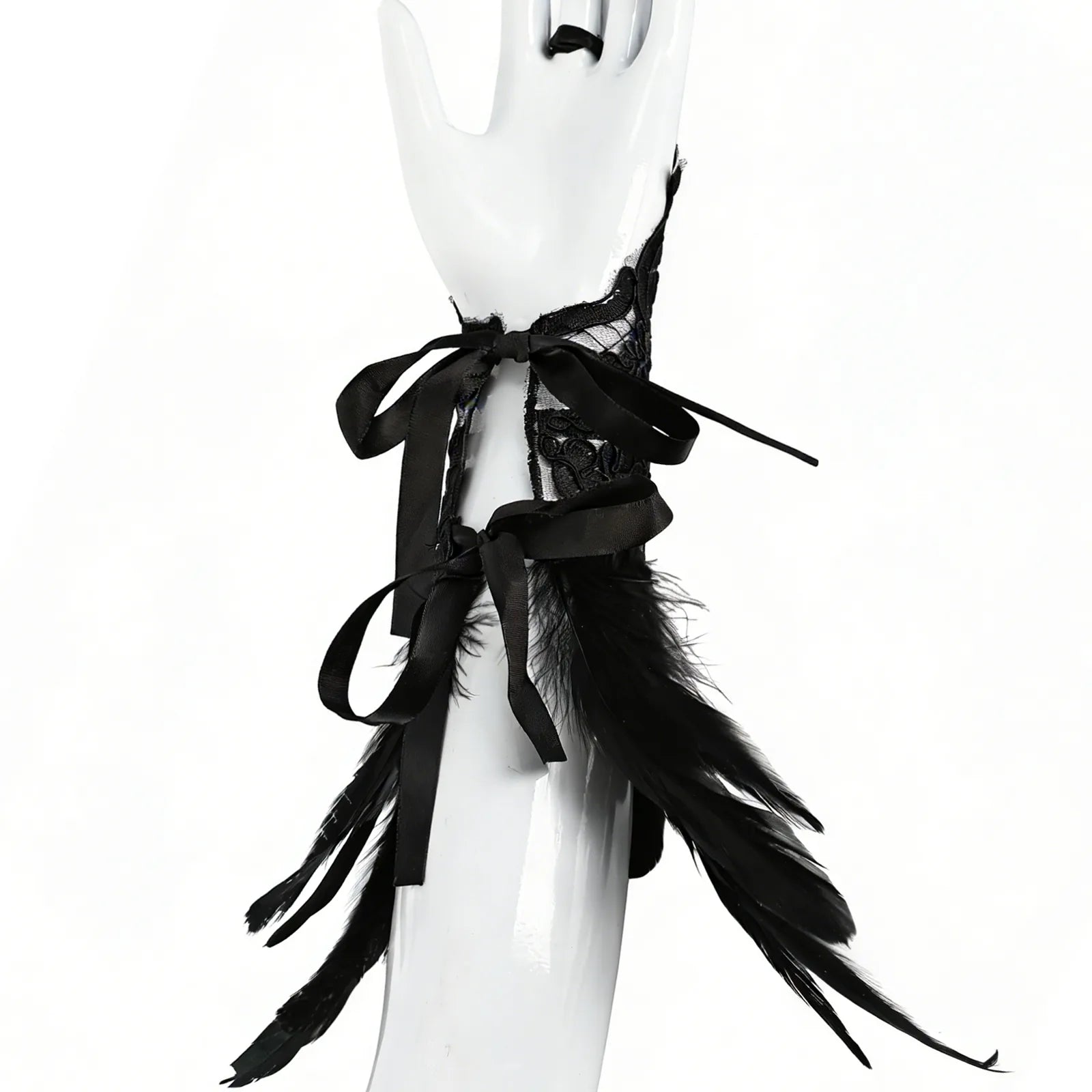 Side view of the gothic lace feather wrist cuffs, showing its profile and visible construction details.