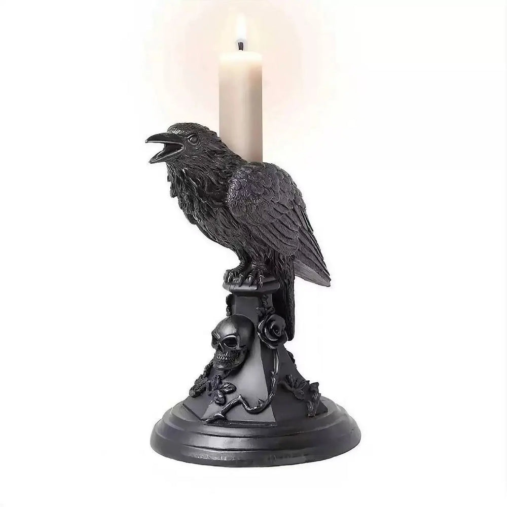 Black gothic raven candle holder with skull and rose embellishments on white background