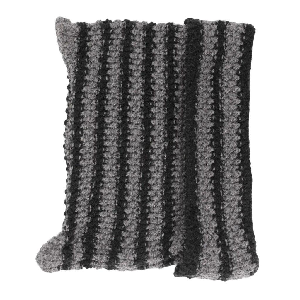 Flat back view shows the striped knit construction and pointed corners.