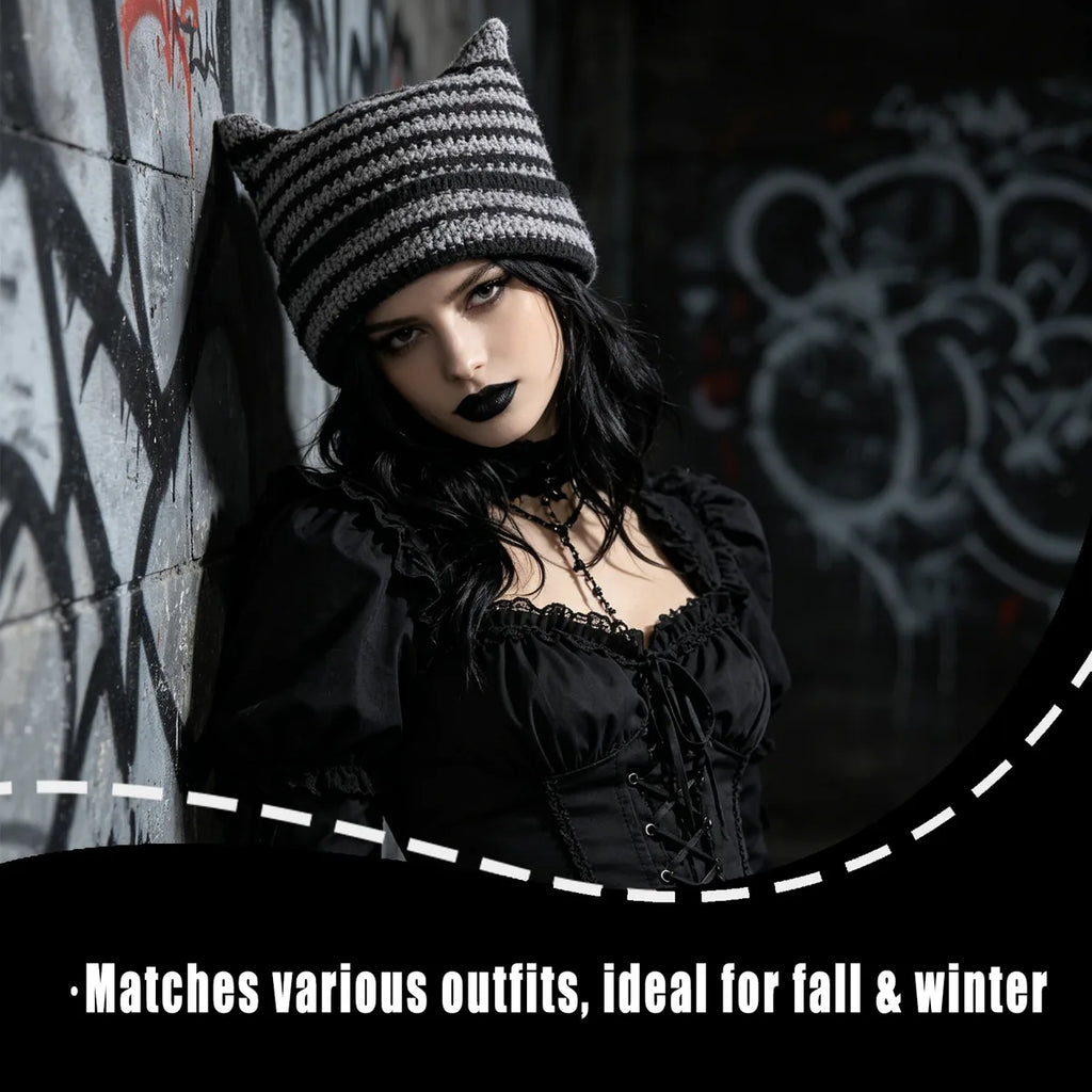 Gray and black striped horn knit hat styled with a gothic outfit.