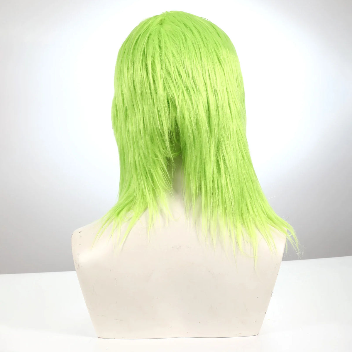 The rear of the green character mask is covered with long green hair.