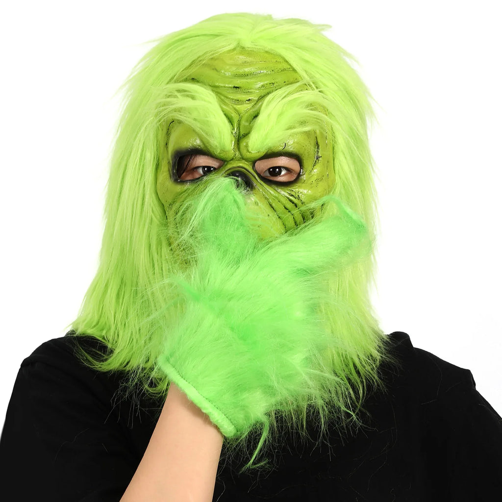 A model wears the green character mask with a separate glove covering the mouth.