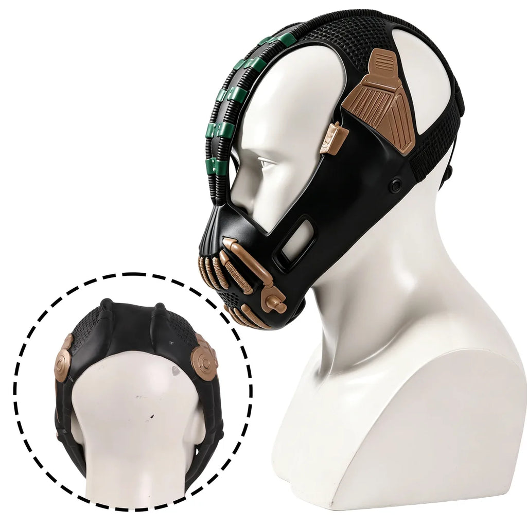 Adult wears the green and gold villain mask in a front view.